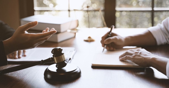client consulting with a lawyer