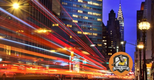 cars whizzing by in NYC